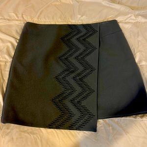 Charcoal grey skirt with slit appearance